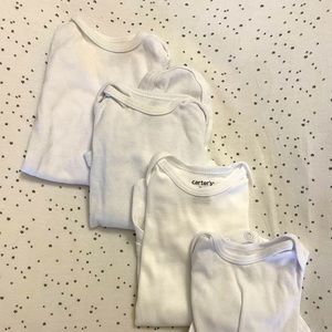 Set of 4 Carter’s white long-sleeve onesie